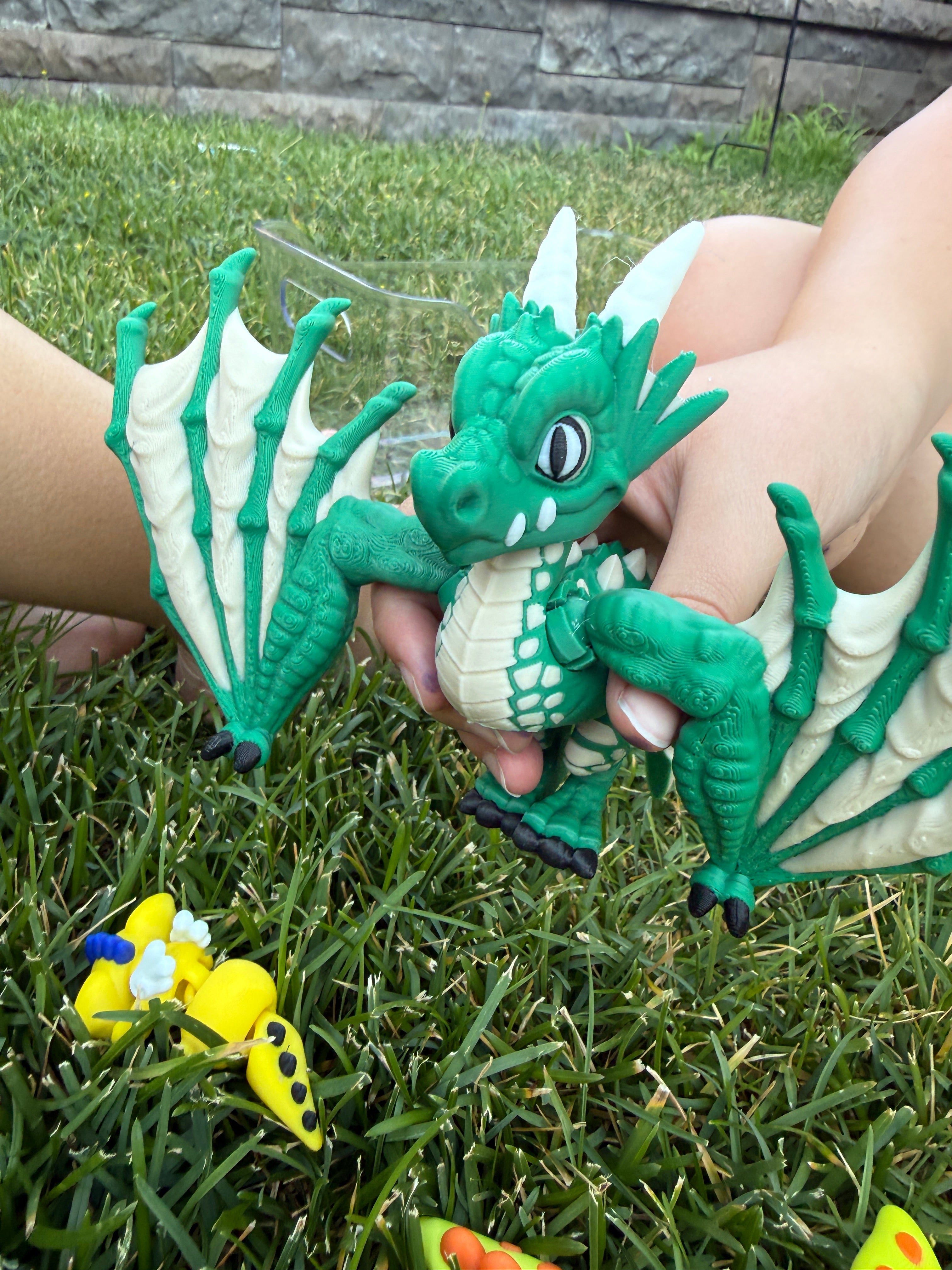 No, it's not a dragon, its a Wyvern. And it is 3D Printed.