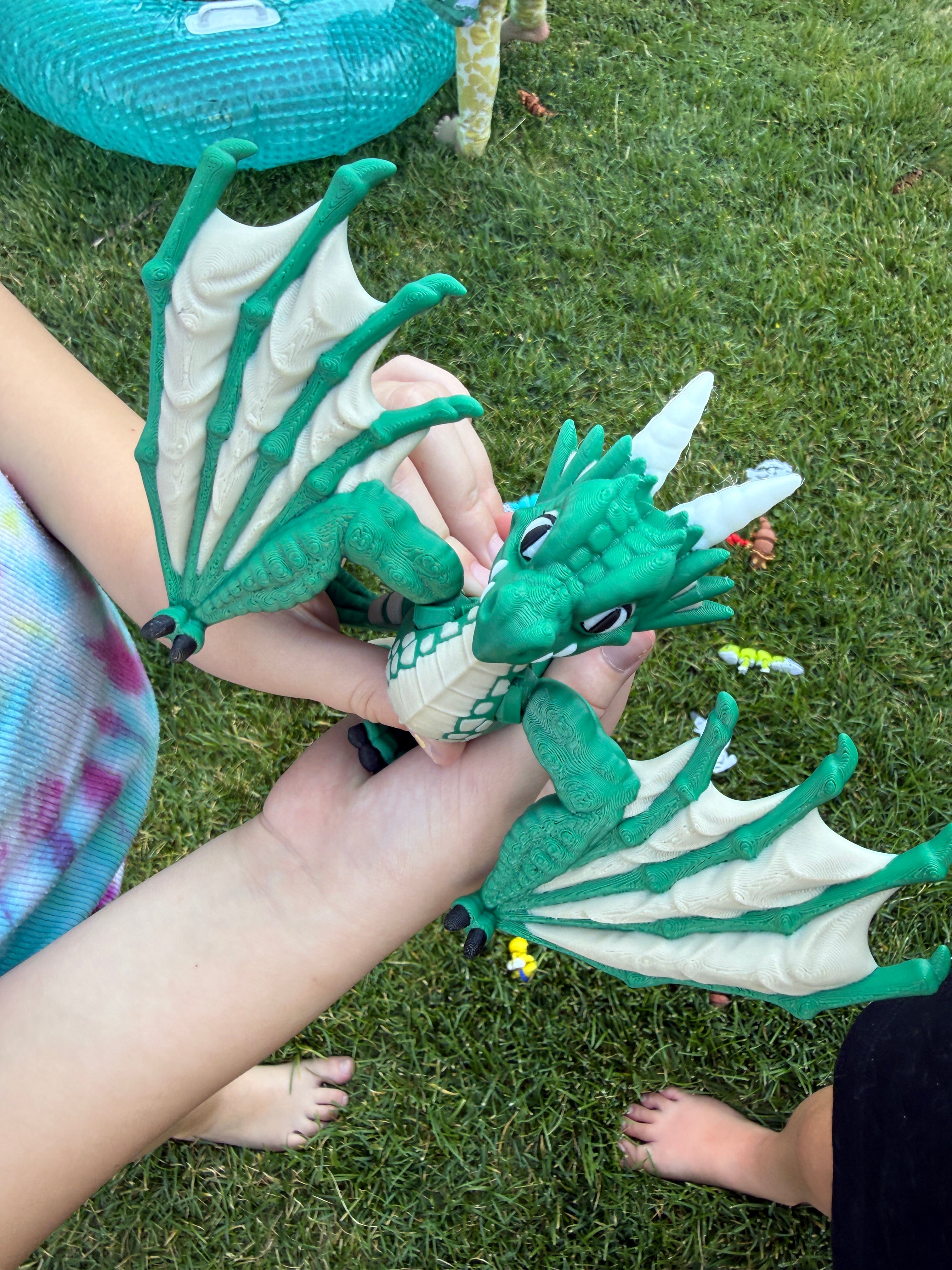 No, it's not a dragon, its a Wyvern. And it is 3D Printed.