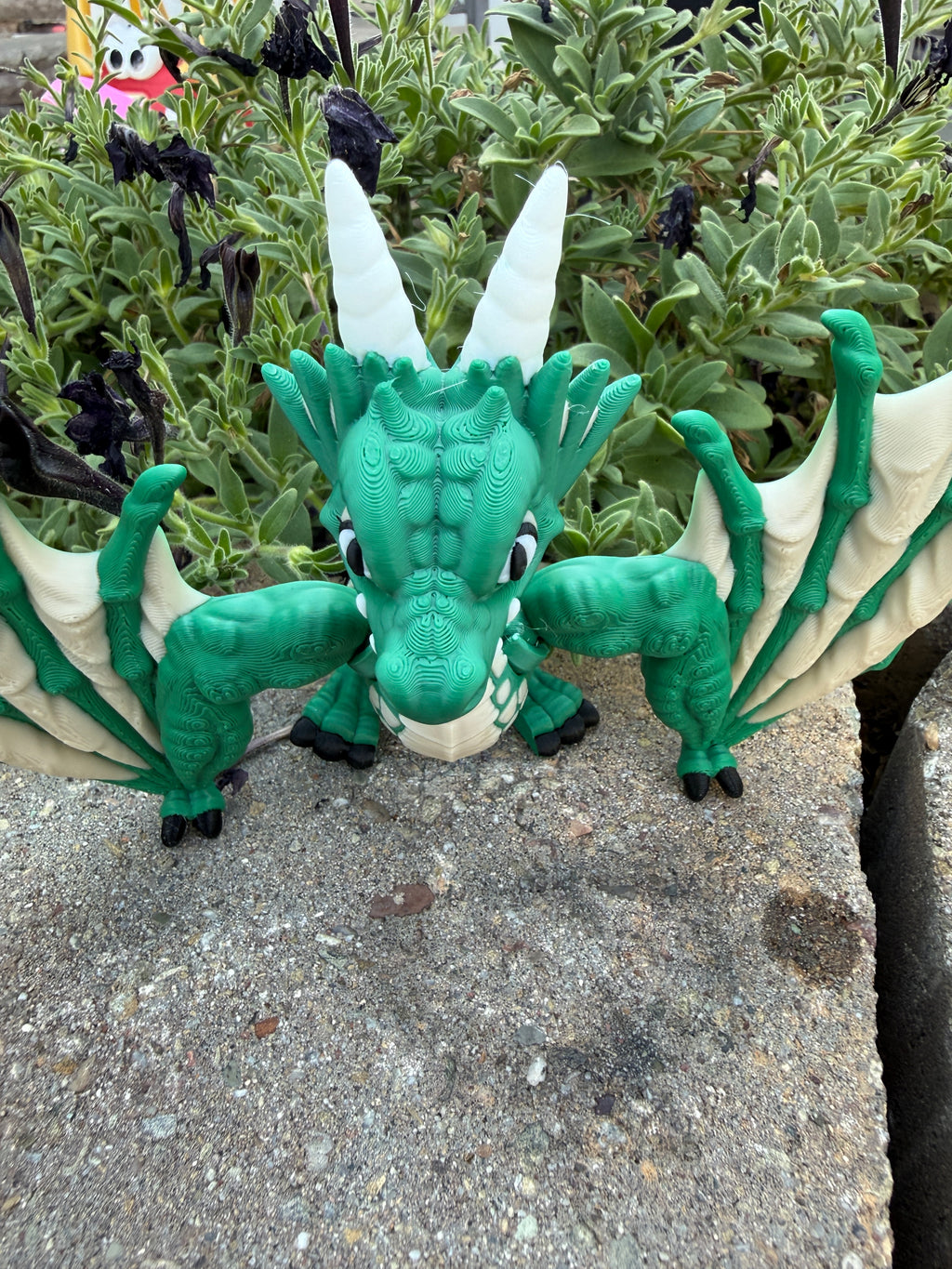 No, it's not a dragon, its a Wyvern. And it is 3D Printed.